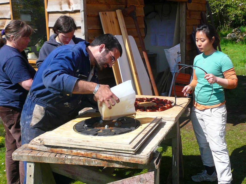 Kostas pours the resin in